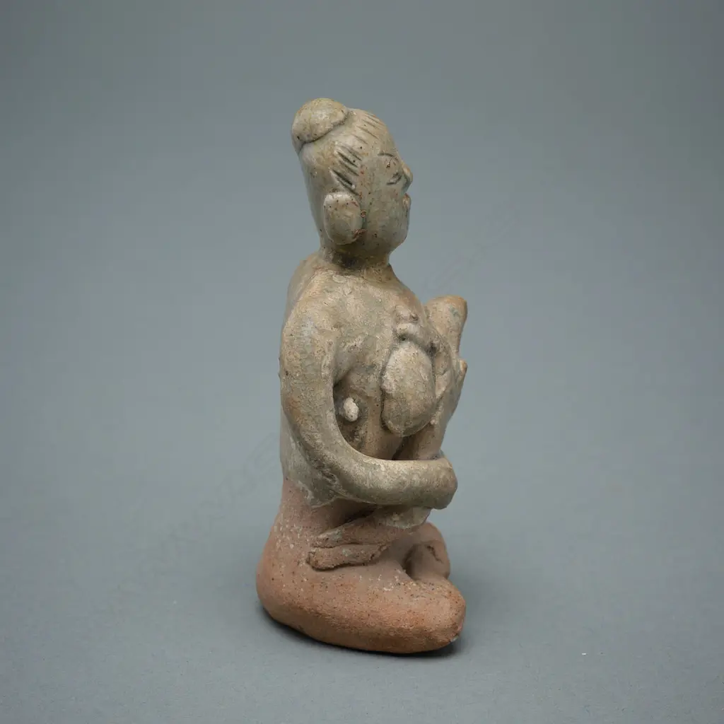 A Sawankhalok stoneware figure (tukatha), Image 1++